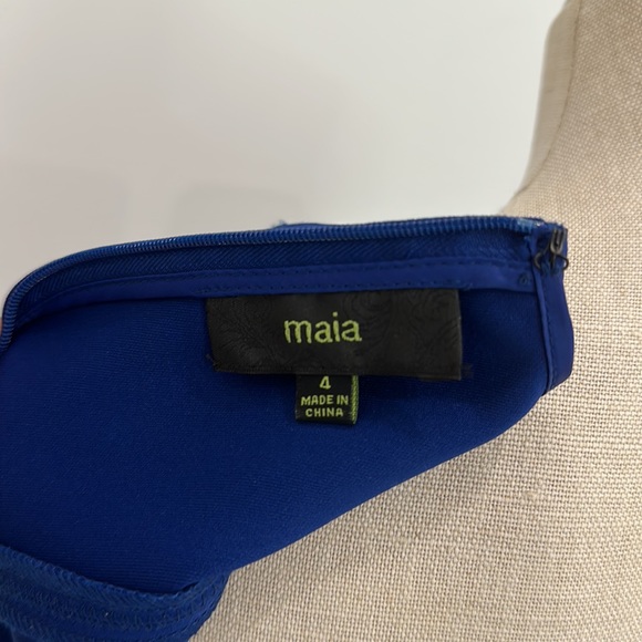 Classic style combines with modern, edge trend for a dress that is flattering. - Picture 6 of 8